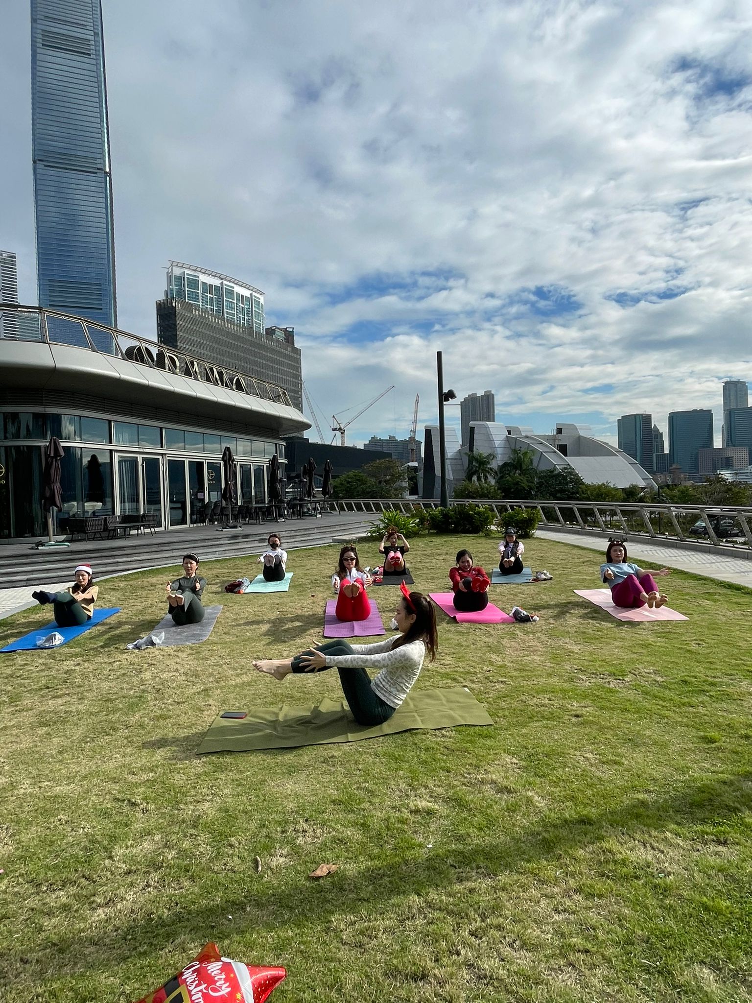 Yoga class members with Christmas gifts