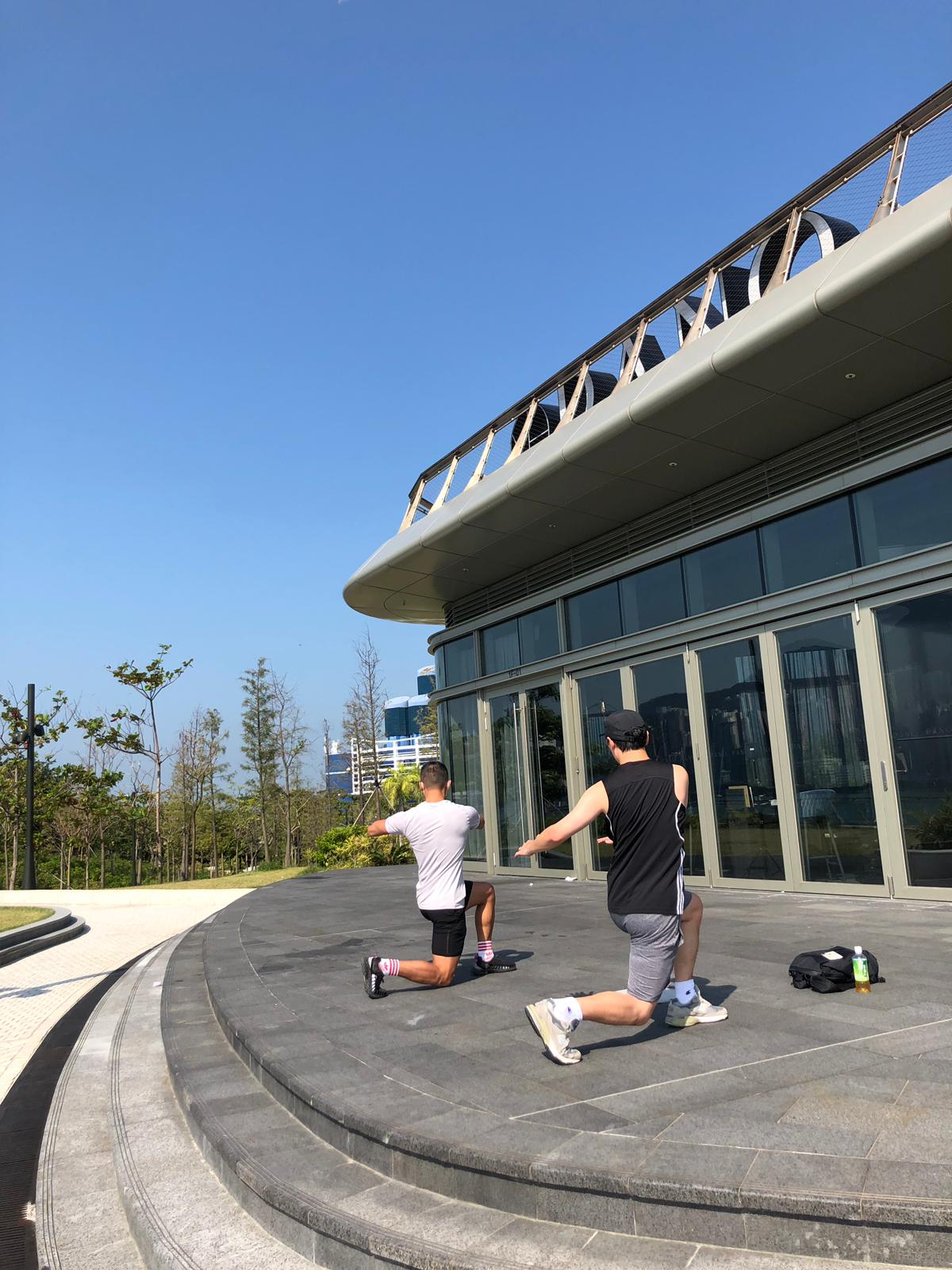 Personal trainer leading an outdoor training session